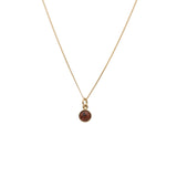 Basic Granit S 18K halsband med rund Åländsk granit infattad i 18K guld på tunn kedja.